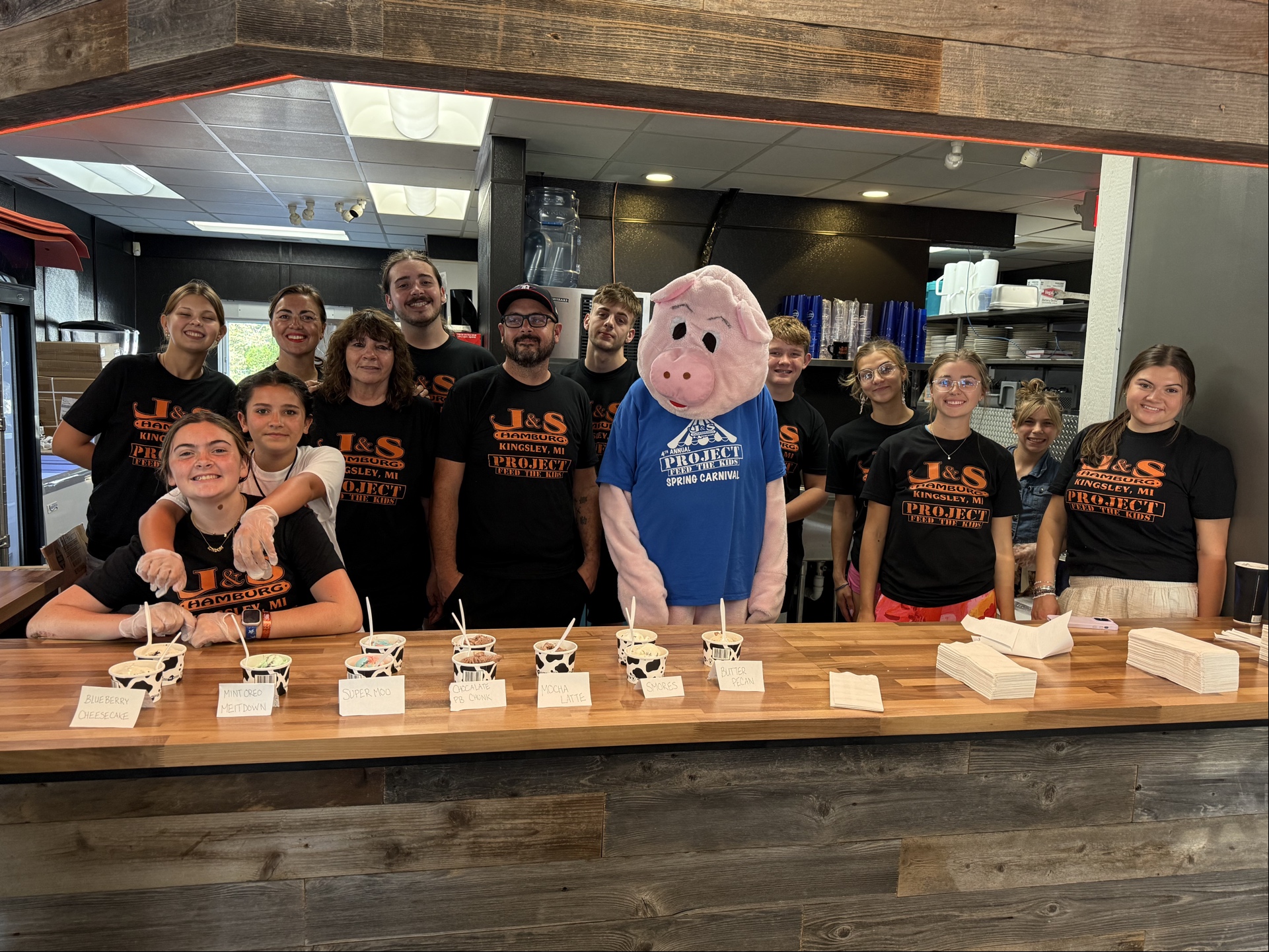 J&S Kingsley team at Project Feed the Kids event with ice cream